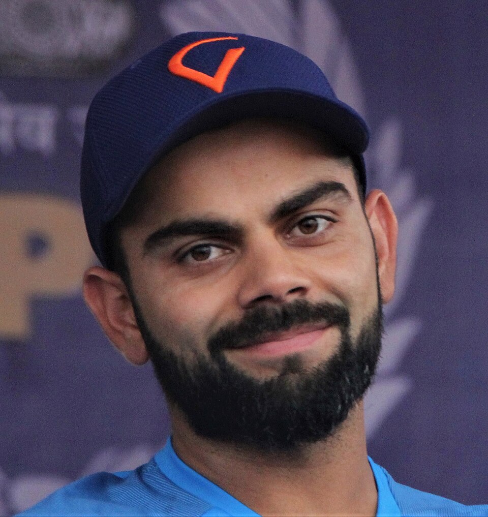Virat Kohli in his India jersey and navy cap